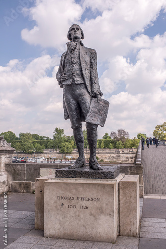 Monument to Jefferson at Bridge Leopold Sedar Senghor. Citizens go on their own business