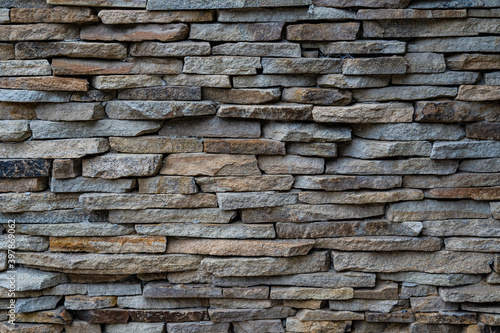 Decorative brick wall with brown seamless texture