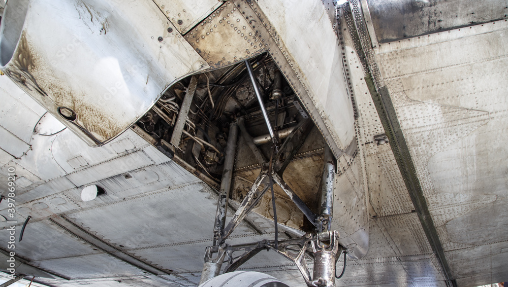 close-up details of aircraft 50s, aluminum skin, landing gear and wing close-up.