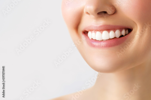 Perfect healthy teeth smile of a young woman. Teeth whitening. Image symbolizes oral care dentistry, photo