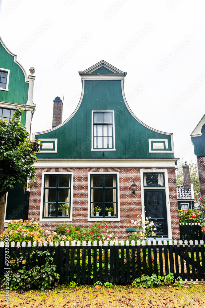 Fototapeta premium Traditional Dutch house in Zaanse Schans. Small village in Amsterdam, Netherlands.