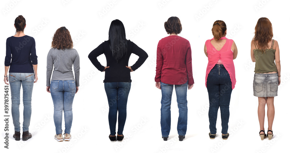 Obraz premium rear view of a woman with jeans on white background