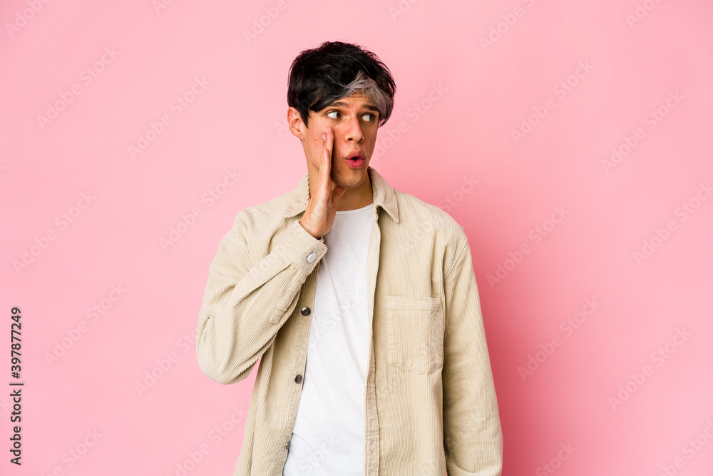Young skinny hispanic man is saying a secret hot braking news and looking aside Young skinny hispanic man is saying a secret hot braking news and looking aside