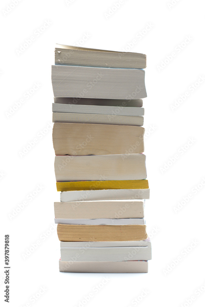 Closeup of books pile on white background Closeup of books pile on white background