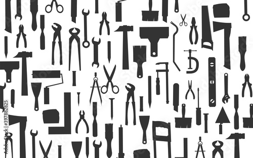 Construction tools. Background. For work as a painter, carpenter, builder, handyman. Repair and construction services. Sale of tools. Monochrome silhouette.