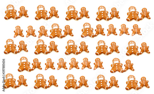 Pattern of gingerbread man in protective mask on white background. Christmas mood or food design. Creative copy space.