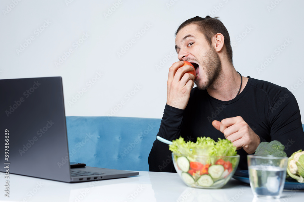 Social media influencers or content maker concept. Guy eating healthy food and expresses emotions. Healthy lifestyle. Social media influencers or content maker concept. Guy eating healthy food and expresses emotions. Healthy lifestyle.