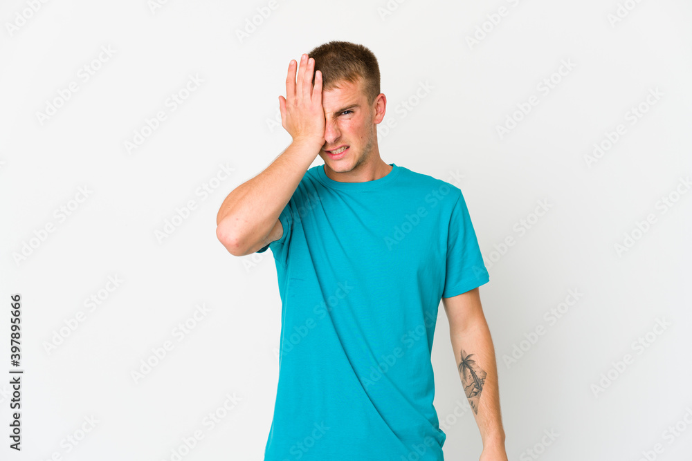 Young caucasian handsome man forgetting something, slapping forehead with palm and closing eyes. Young caucasian handsome man forgetting something, slapping forehead with palm and closing eyes.