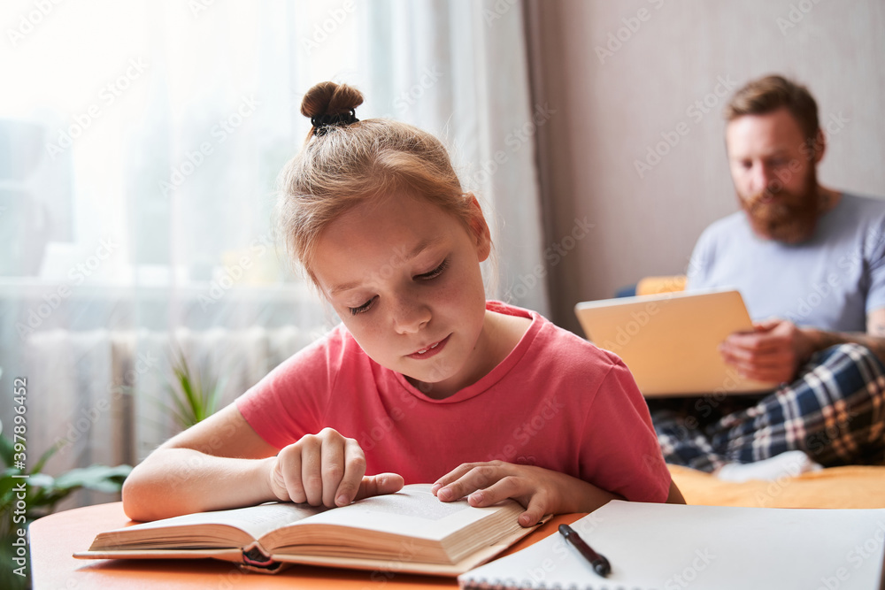 Girl studying with books and preparing for test exam Girl studying with books and preparing for test exam