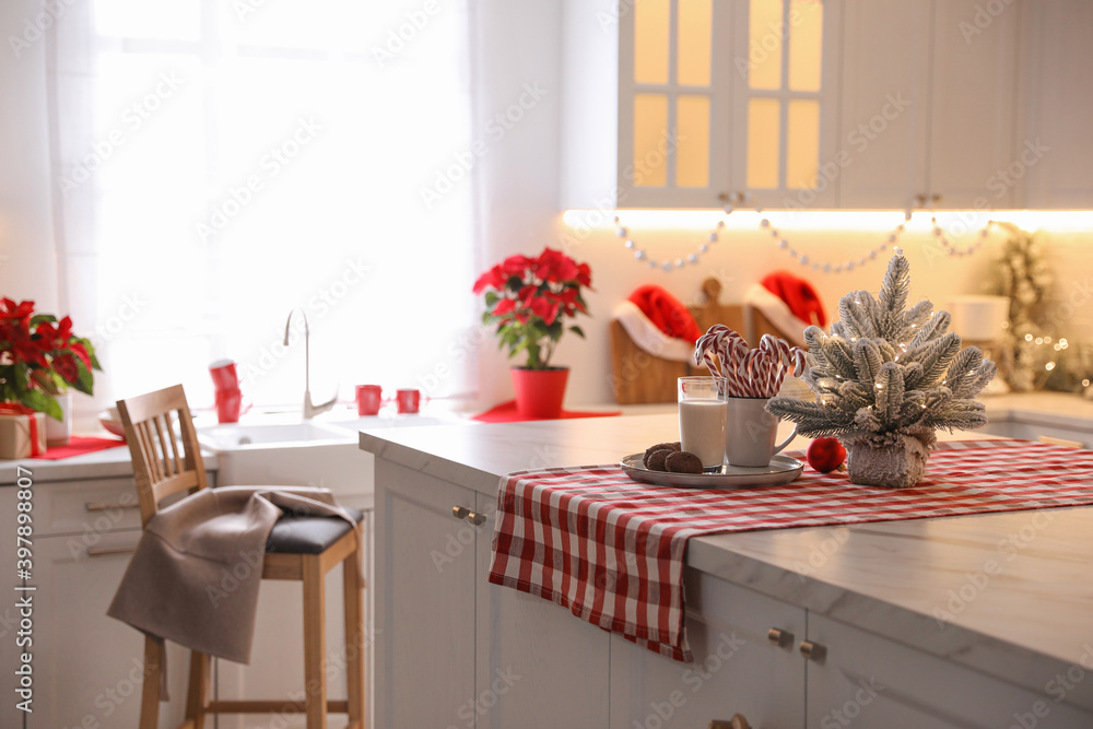 Beautiful kitchen interior with stylish Christmas decor