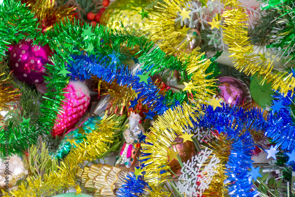 Colorful garlands and Christmas decorations close-up