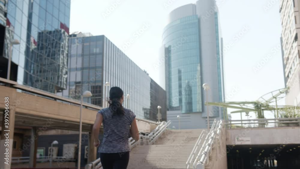 Woman in City Running Sport and Making Exercise Woman in City Running Sport and Making Exercise