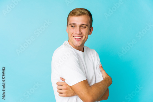 Young caucasian handsome man laughing and having fun.