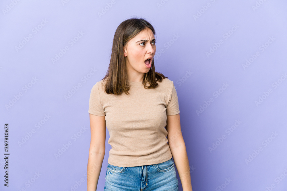 Young caucasian woman shouting very angry, rage concept, frustrated. Young caucasian woman shouting very angry, rage concept, frustrated.