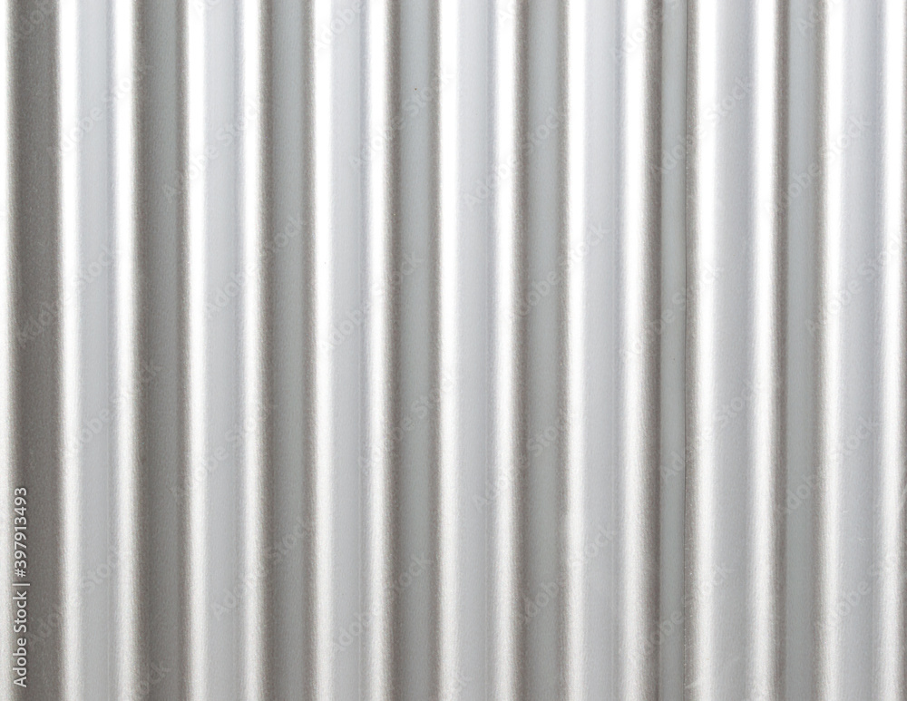 background texture-close up of a stylish corrugated metal wall background texture-close up of a stylish corrugated metal wall