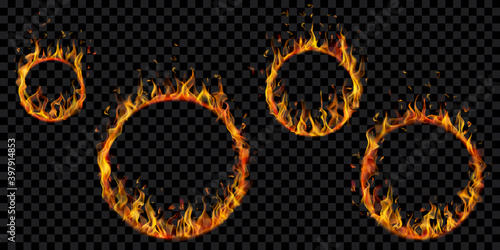 Set of burning hoops in different sizes with translucent fire flames on transparent background. For used on dark illustrations. Transparency only in vector format