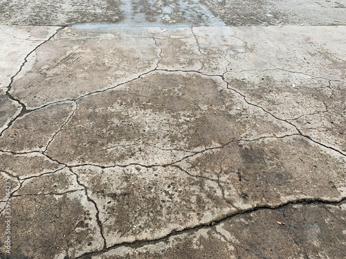 Cracks of concrete surface (driveway cracks) 