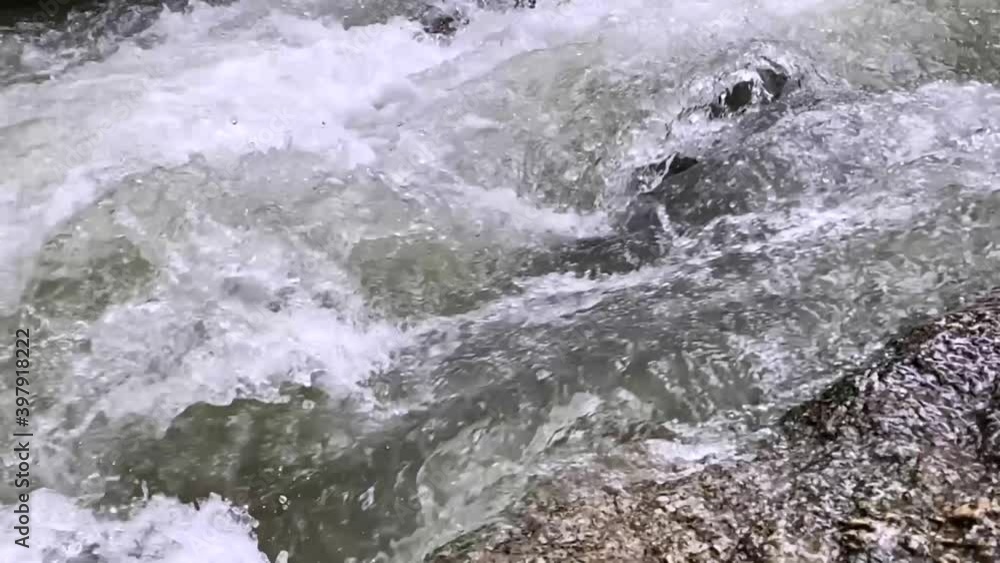 slow motion tons of water flowing down the stream, extreme adventure outdoor tourism destination, rafting or water activities in a tropical country, summer holiday vacation place to Thailand.