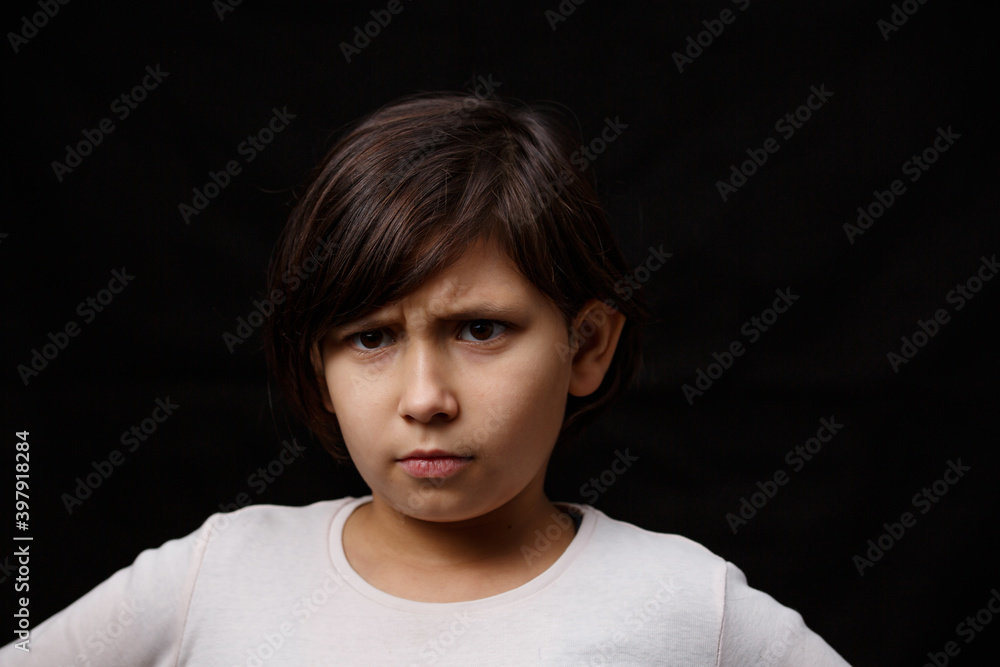 Portrait of a girl on a black background. Portrait of a girl on a black background.