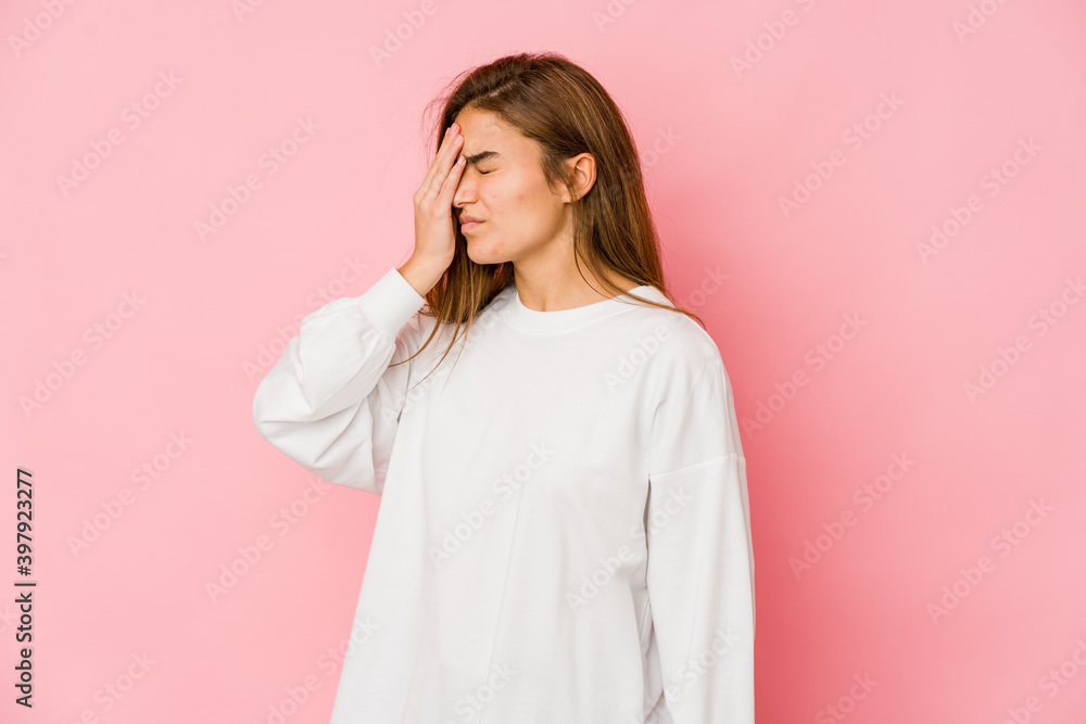 Young skinny caucasian teenager girl having a head ache, touching front of the face. Young skinny caucasian teenager girl having a head ache, touching front of the face.