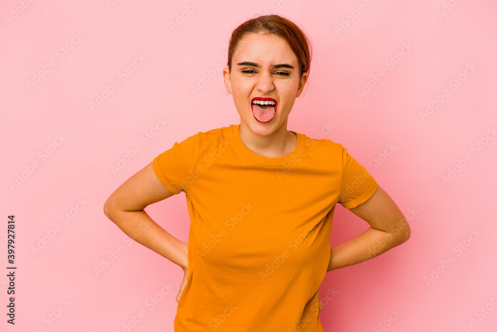 Young arab mixed race woman funny and friendly sticking out tongue. Young arab mixed race woman funny and friendly sticking out tongue.