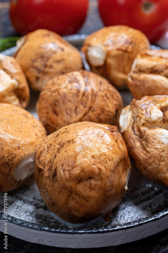 Tasty Italian food, small balls of smoked mozzarella soft cheese Tasty Italian food, small balls of smoked mozzarella soft cheese
