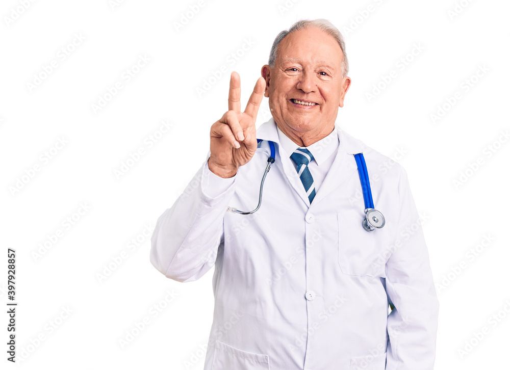 Senior handsome grey-haired man wearing doctor coat and stethoscope smiling looking to the camera showing fingers doing victory sign. number two. Senior handsome grey-haired man wearing doctor coat and stethoscope smiling looking to the camera showing fingers doing victory sign. number two.