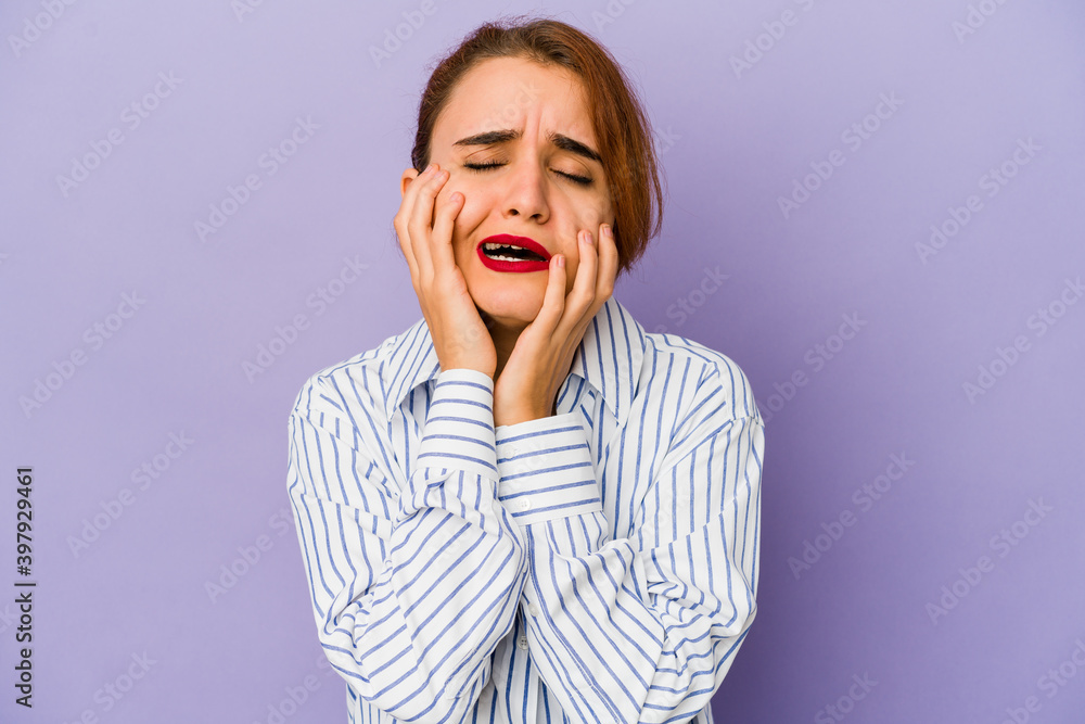 Young arab mixed race woman whining and crying disconsolately. Young arab mixed race woman whining and crying disconsolately.