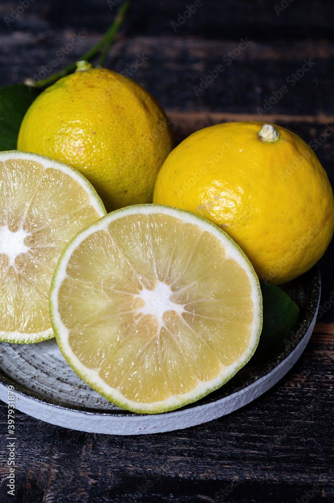 Fresh ripe bergamot orange fruits, fragrant citrus used in earl grey tea, medicine and spa treatments