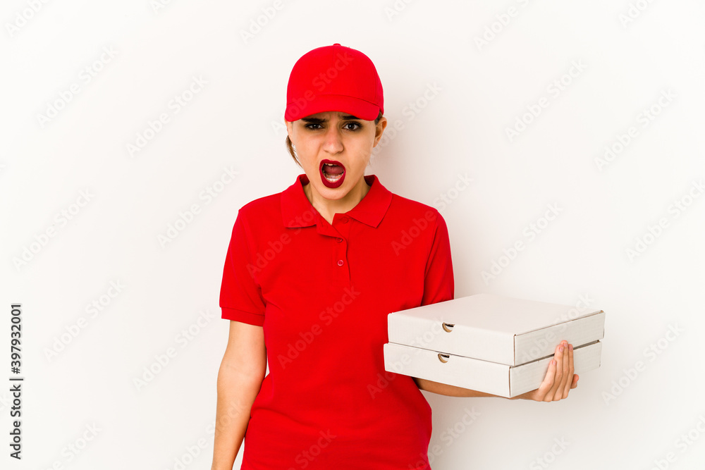 Young skinny arab pizza delivery girl pointing upside with opened mouth. Young skinny arab pizza delivery girl pointing upside with opened mouth.