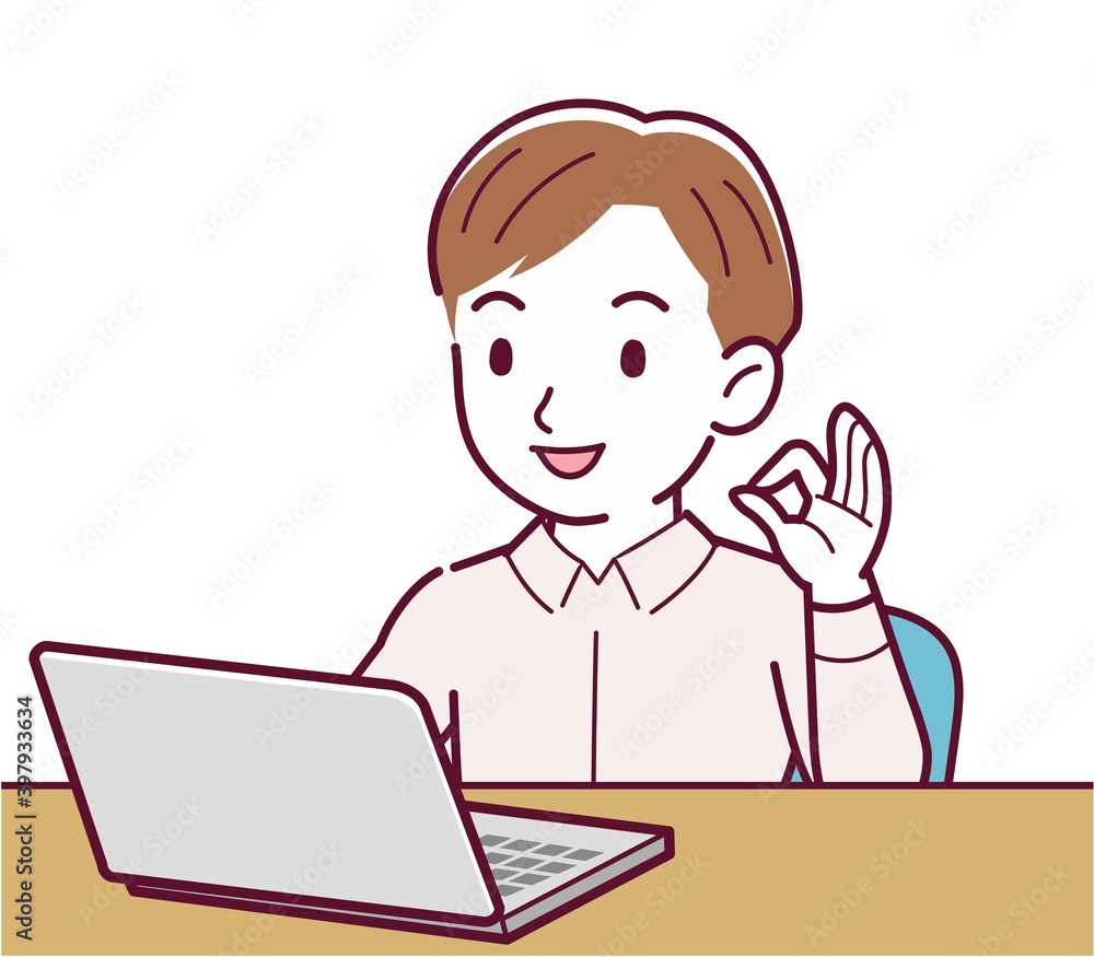 A man in a pink shirt using a computer A man in a pink shirt using a computer