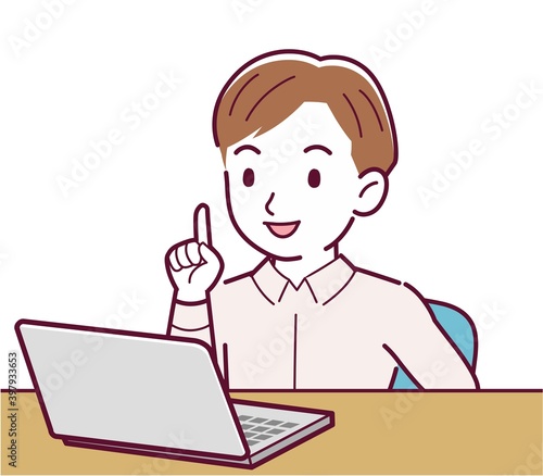 A man in a pink shirt using a computer