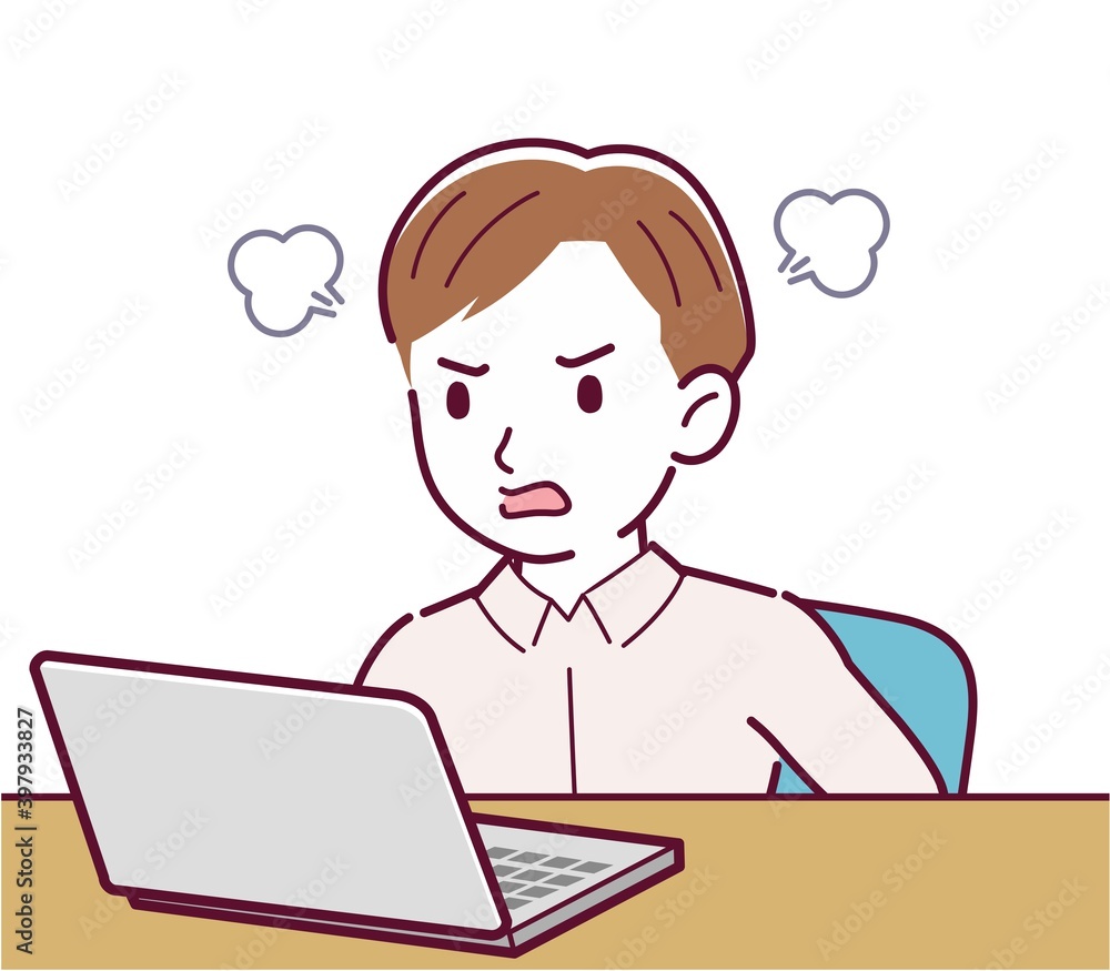 A man in a pink shirt using a computer A man in a pink shirt using a computer