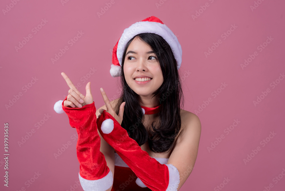 Portrait of cute Asian Christmas Santa Claus girl Portrait of cute Asian Christmas Santa Claus girl