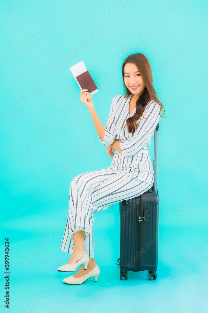 Portrait beautiful young asian woman with luggage passport and boarding pass Portrait beautiful young asian woman with luggage passport and boarding pass