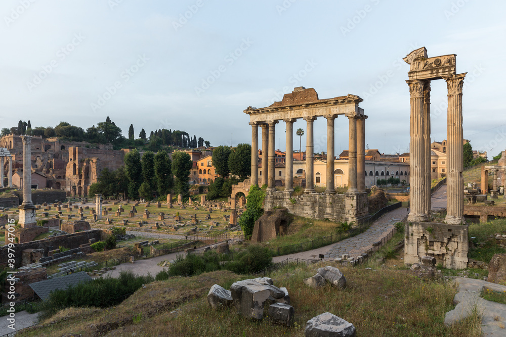 Sunrise landscapes of the empty Roman Forum, view of the Temple of Vespasian and Titus