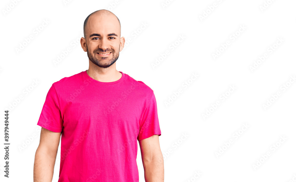 Young handsome man wearing casual t shirt with a happy and cool smile on face. lucky person. Young handsome man wearing casual t shirt with a happy and cool smile on face. lucky person.
