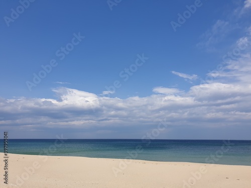 The harmony of the sandy beach  sea and sky in Gangneung
