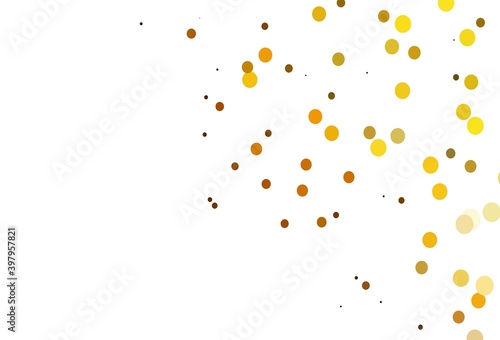 Light Yellow  Orange vector backdrop with dots.