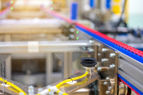 Wallpaper Mural Automation concept: View of conveyor unit in robot glass sealing machine of automotive factory. Torontodigital.ca