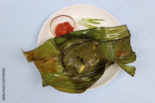 Paneer Pollichatu, Cottage cheese wrapped and cooked in banana leaves, Kerala traditional food  photo