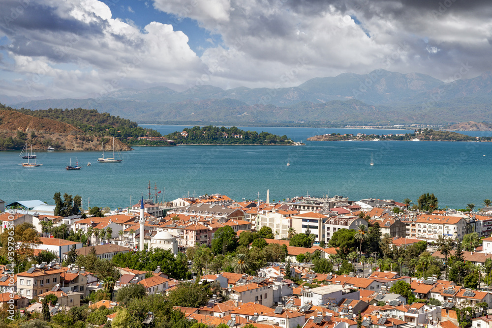 Fototapeta premium panorama of Fethiye city. aerial view of the popular tourist city of Fethiye and the Bay of the Mediterranean sea