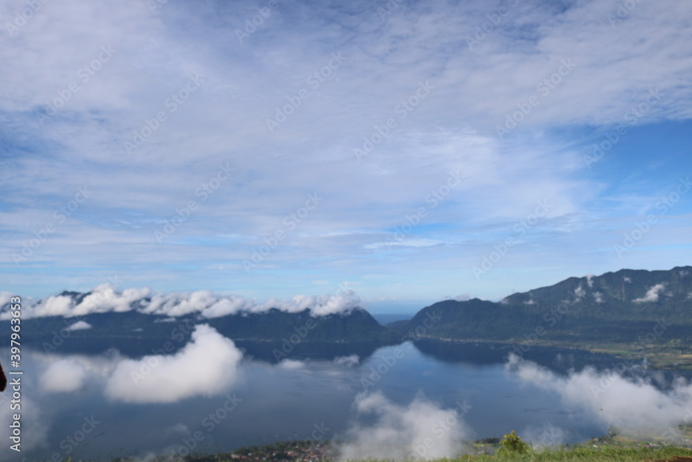 Fototapeta premium this place is called Puncak Lawang, Indonesia. this peak is so high that we are equal to the clouds. the scenery is so beautiful and the temperature here is very cold #indonesia #sumbar