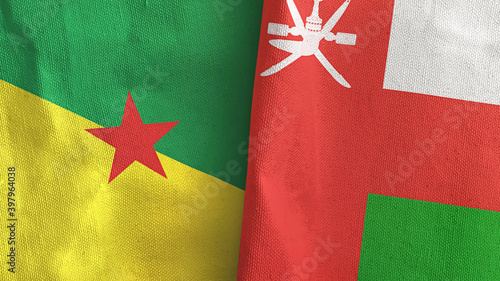 Oman and French Guiana two flags textile cloth 3D rendering photo