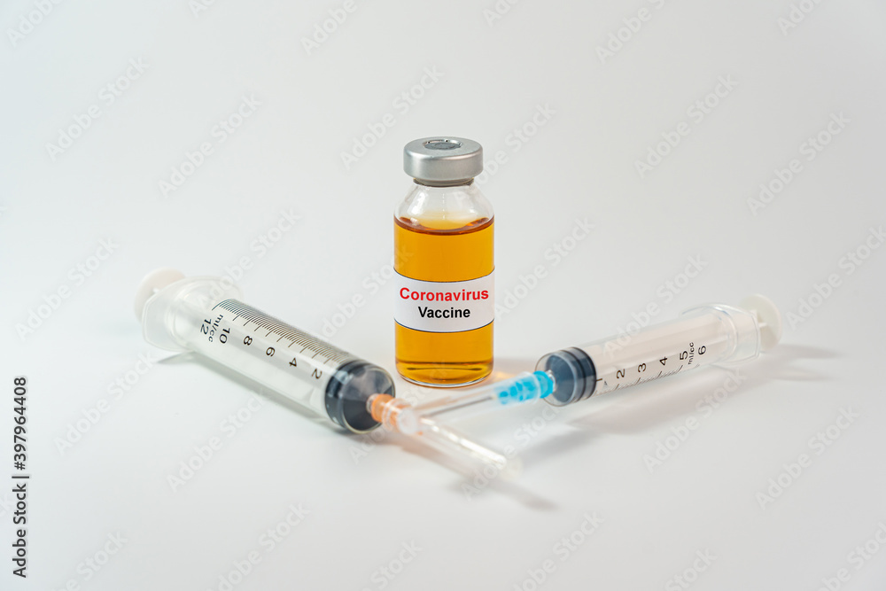 Coronavirus vaccine in bottle and syringe for COVID-19 pandemic concept Coronavirus vaccine in bottle and syringe for COVID-19 pandemic concept