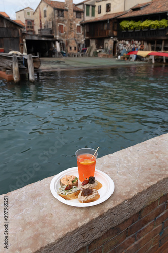 Cicchetti and Aperol Spritz traditional venetian food and drink