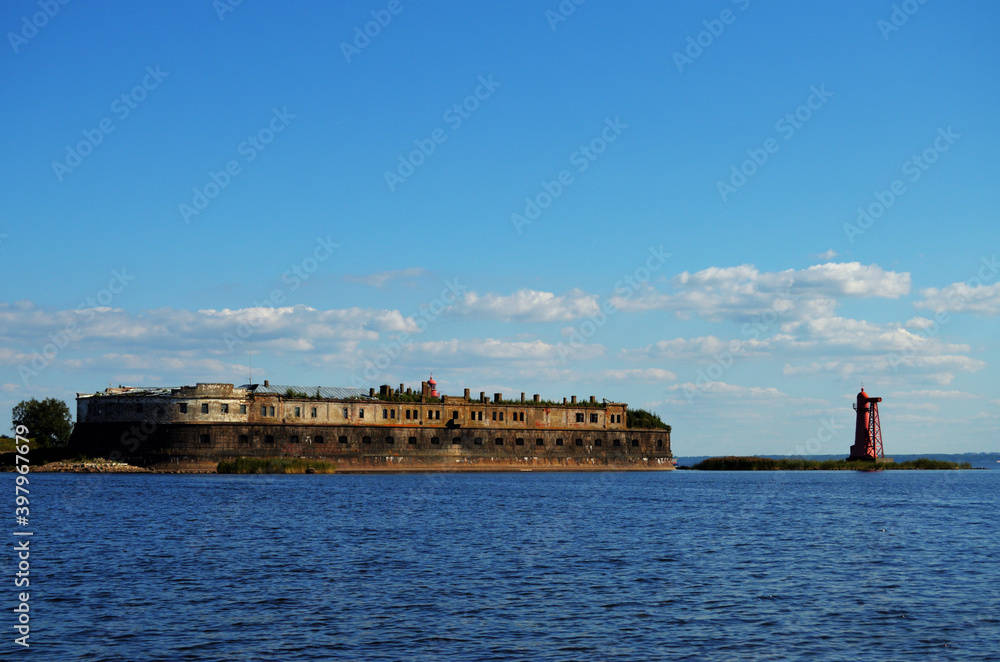 The fort is old destroyed in the waters of the Gulf of Finland off the coast of Kronstadt. Russia, St. Petersburg, 17.08.2020. High quality photo