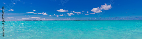 Fototapeta Naklejka Na Ścianę i Meble -  Perfect sky and water of Indian ocean. Calm sea ocean and blue sky background, tropical sea. Blue sea waves, horizon, relax, peaceful endless view. Blue sky and seascape