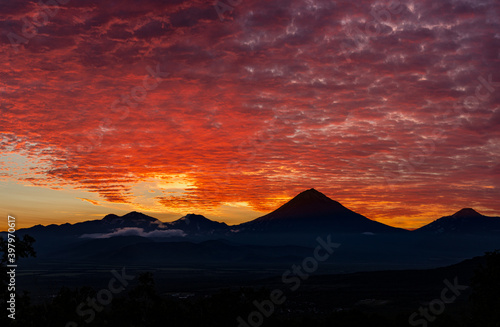 Kamchatka  sunrise over the Koryaksky and Avachinsky volcanoes
