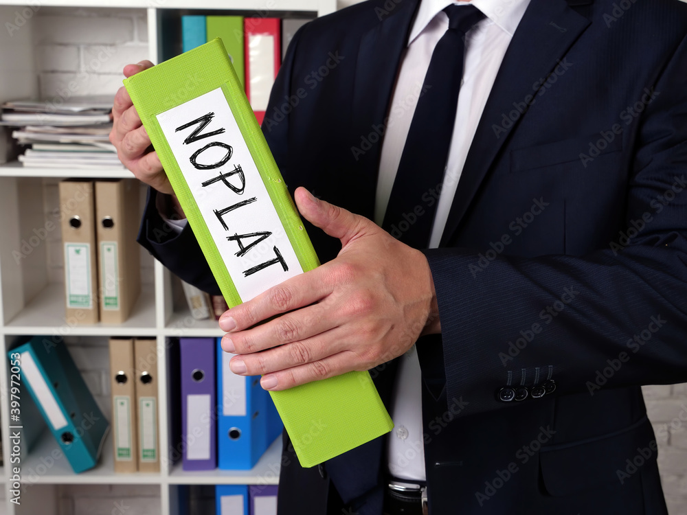 Ταπετσαρία Business concept about Net Operating Profit Less Adjusted Tax NOPLAT with sign on the piece of paper